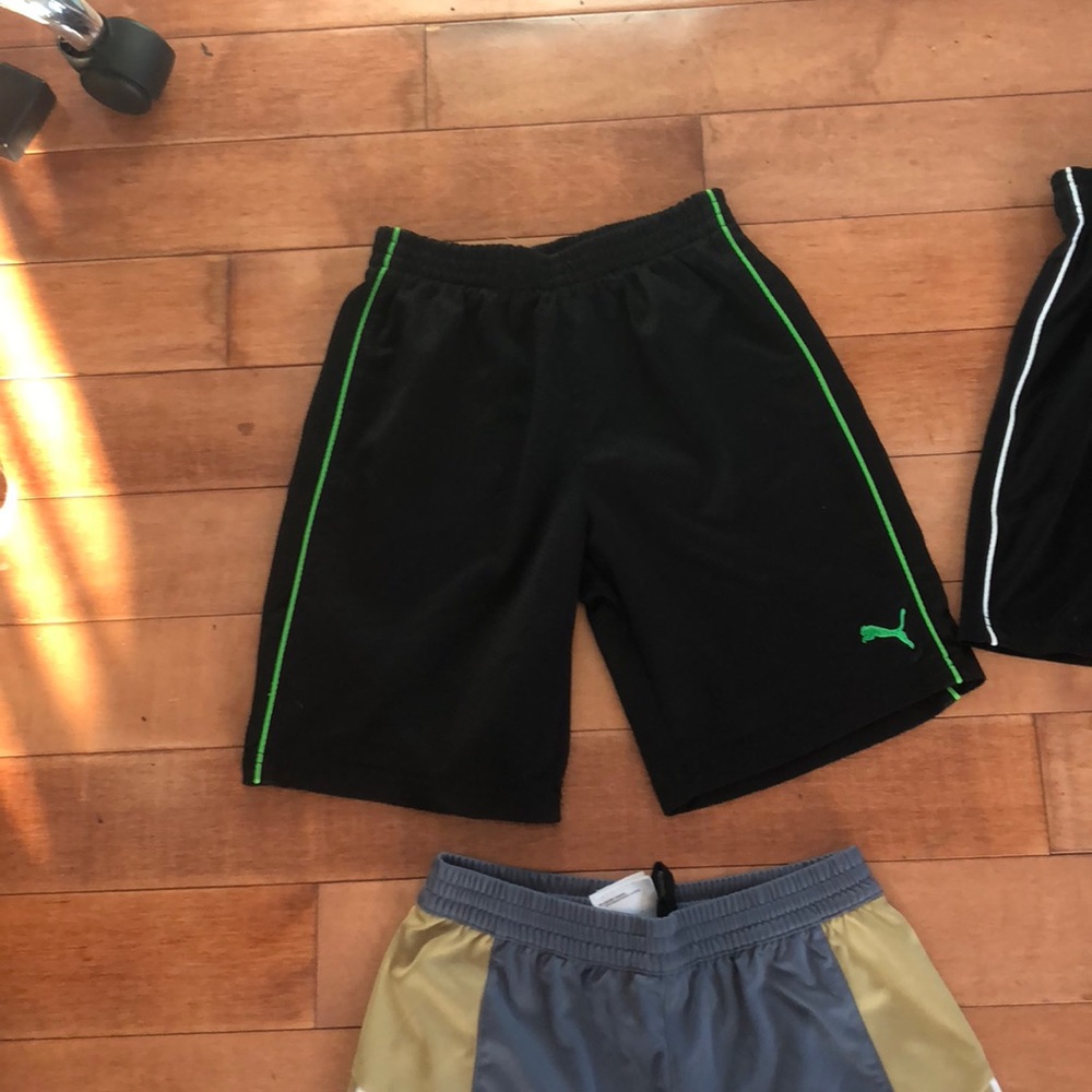 8 pair of kids soccer shorts.